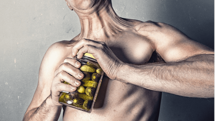 a man with a supplement container