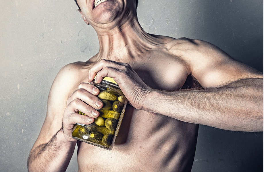 a man with a supplement container